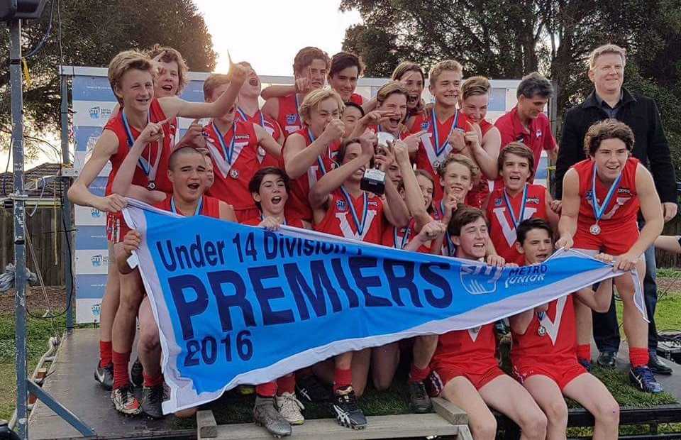 East Brighton Vampires accepting their Premiership AFL Trophy